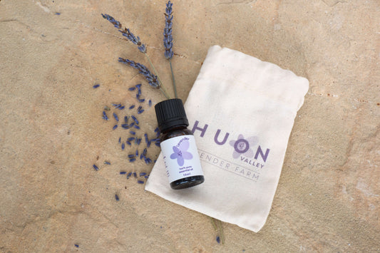 Huon Valley Lavender Essential oil on a stone backdrop